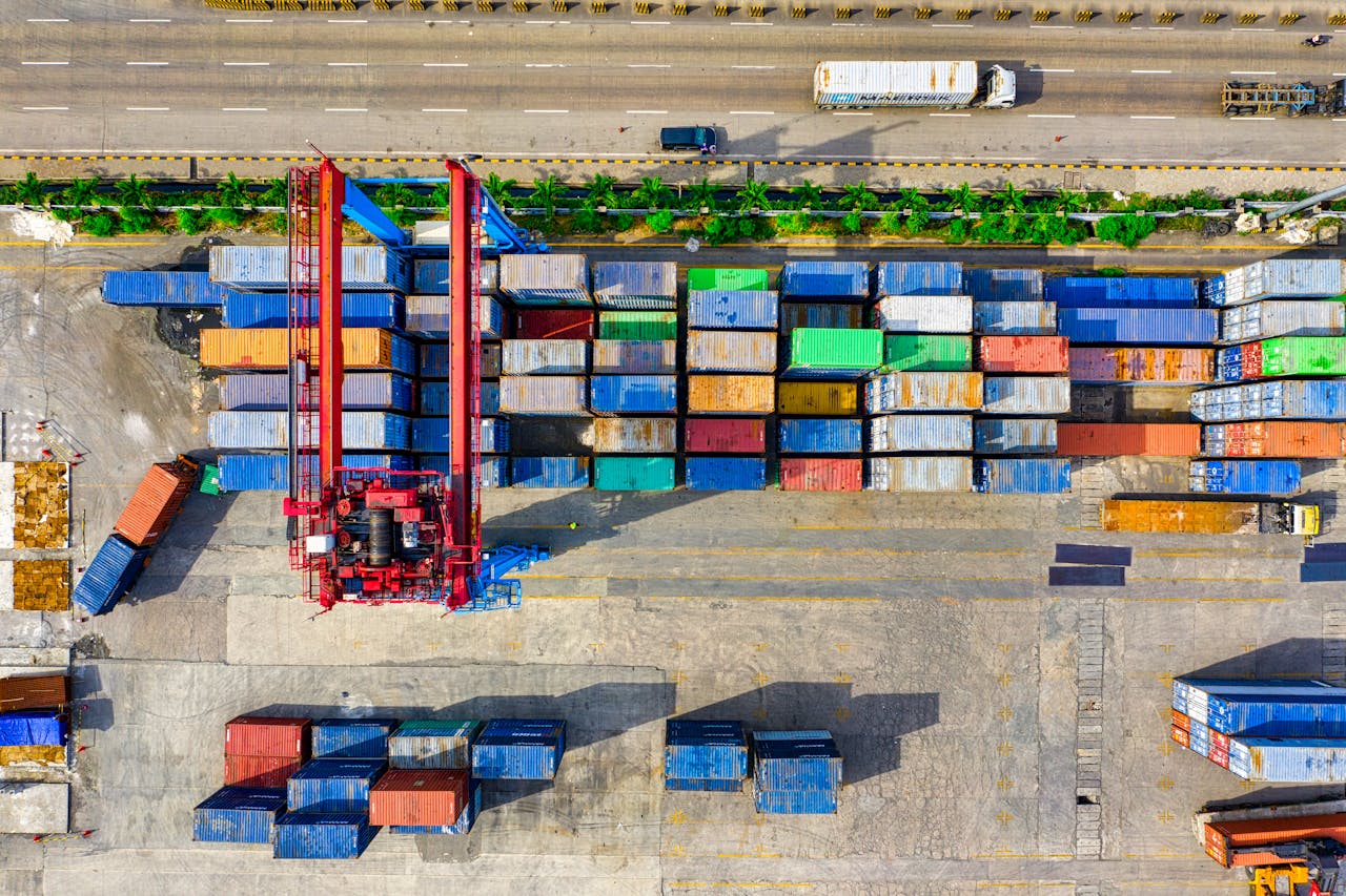 services-03 Colorful cargo containers organized at a shipping yard in North Jakarta, Indonesia.